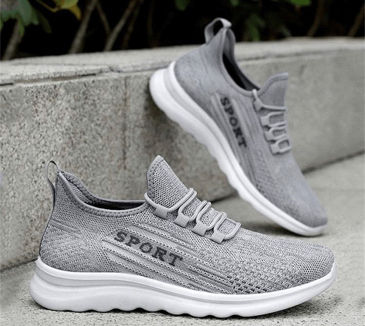 Gray stylish breathable elastic lace up sneakers for men with ‘SPORT’ design, featuring lightweight mesh material and flexible sole.